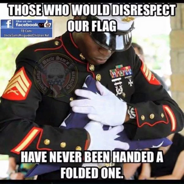 marine_hugging_flag.jpg
